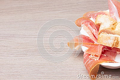 Slices of cured pork ham with bread. Stock Photo