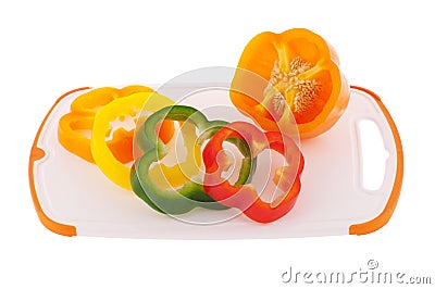 Slices of different colored bell peppers Stock Photo