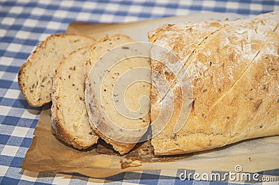 Slices of fresh homemade white yeast bread with flax seeds, Stock Photo