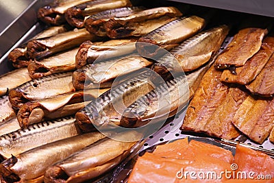 Slices of smoked fish in supermarket Stock Photo
