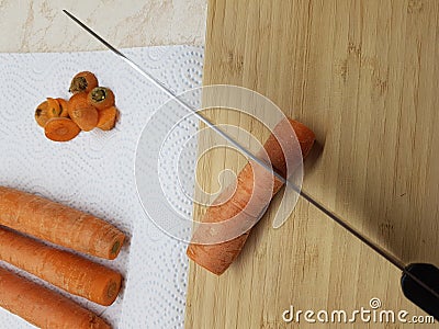 Slicing carrots Stock Photo