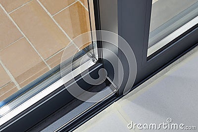 Sliding glass door detail and rail Stock Photo