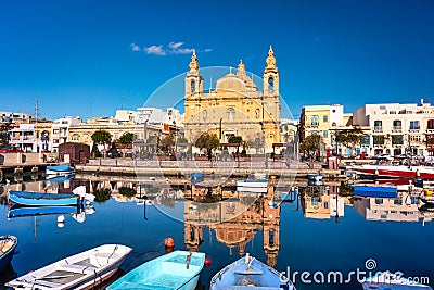 Sliema, Malta - January 10, 2020: Architecture of the harbor in Sliema city at sunrise, Malta Editorial Stock Photo