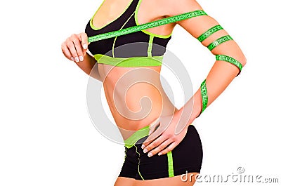 Slim figure of girl with a centimetre ribbon on a hand Stock Photo