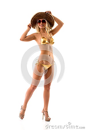 Slim girl in gold bikini Stock Photo