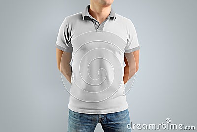 Slim man in the white polo shirt. Mockup for your graphic design Stock Photo