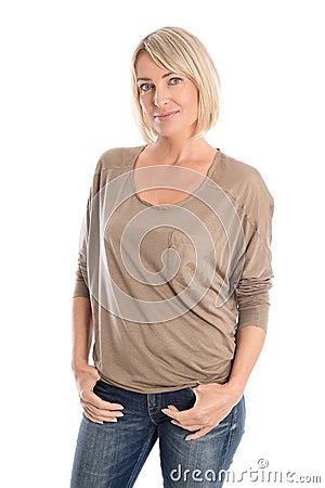 Slim nice smiling older woman isolated over white wearing jeans Stock Photo