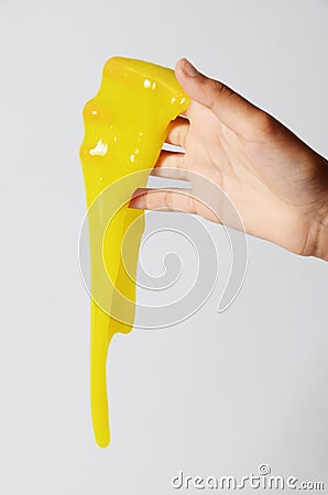 Slime elastic and viscous on child`s hand Stock Photo
