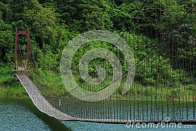 Sling Bridge over the river Stock Photo