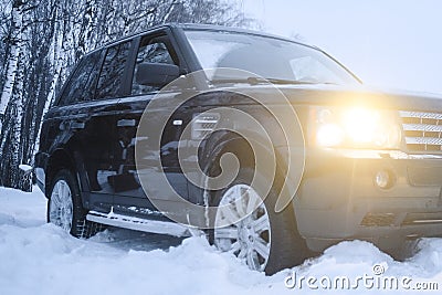 Slipping all-road car in the snow Stock Photo