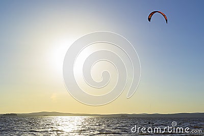 Slipping through the waves with a parachute Stock Photo