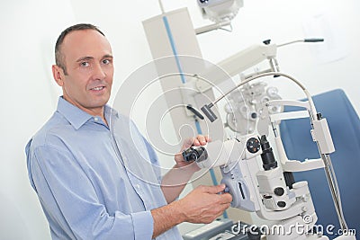 Slit lamp and ophtalmologist Stock Photo