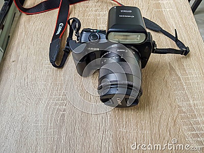 Sliven/Bulgaria - 4/26/2020:Black Canon EOS M. The First mirrorless camera of Canon.It has a solid build, with a magnesium alloy b Editorial Stock Photo