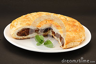 Sloced view Dilkush -Coconut & Tutti Fruity Stuffed Bread , Stock Photo