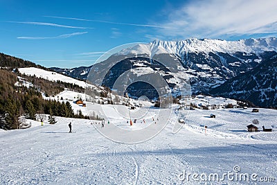 Slope and yellow gondolas in ski resort Serfaus Fiss Ladis in Au Stock Photo