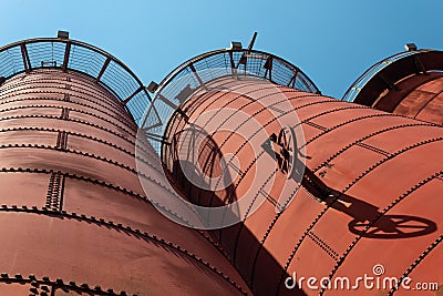 Sloss Furnaces National Historic Landmark, Birmingham Alabama USA, extreme angle looking up at furnaces, open circular catwalks Stock Photo