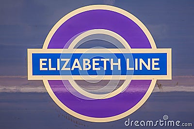 SLOUGH, ENGLAND- 11 September 2022: Elizabeth Line roundel on the side of a train Editorial Stock Photo