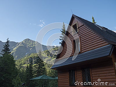 Slovakia, Western Tatra mountain, Rohacska dolina, July 2, 2019: view on Mountain hut Tatliakova Chata, wooden cottage Editorial Stock Photo