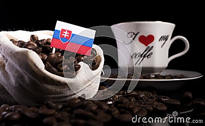 Slovakian flag in a bag with coffee beans on black Stock Photo