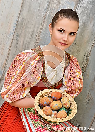 Slovakian girl holding painted easter eggs Stock Photo