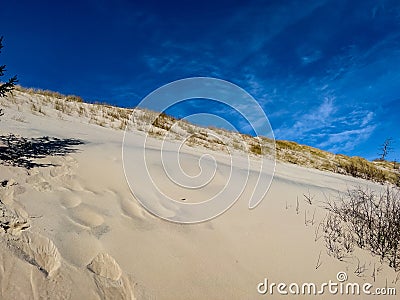 The Slovinski National Park - unique in Europe dune belt of spits with moving dunes, sunny day and blue sky Stock Photo
