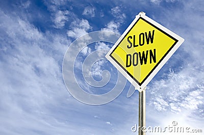 Slow Down road sign Stock Photo