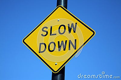 Slow down sign Stock Photo