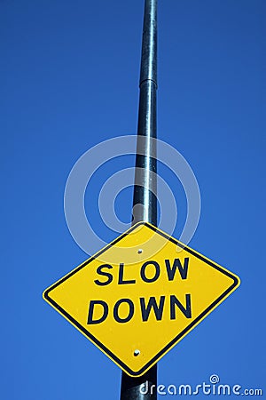 Slow down sign Stock Photo