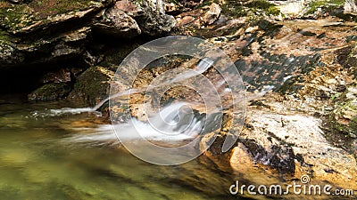 Slow shutter photo of a smooth waterfall Stock Photo