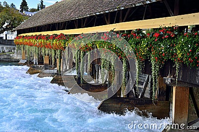 Sluice bridge in Thun, Switzerland. Aare river. Stock Photo