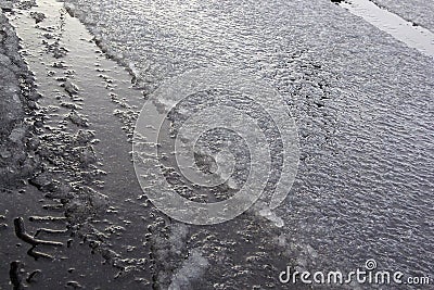 Slush dampness on the road sleet even layer Stock Photo