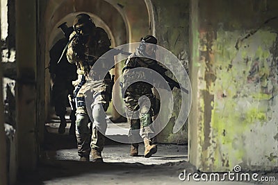 Sly squad troops sneaking into domicile building Stock Photo