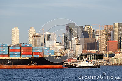 SM Line container ship Qingdao assisted by Crowley tug Response Editorial Stock Photo