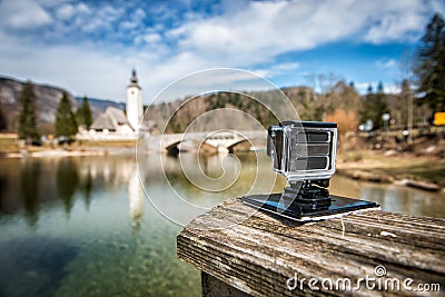 Small action camera filming nice landscape slow motion outdoors Stock Photo