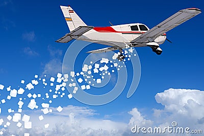 Airplane distributes toilet paper from the air Stock Photo
