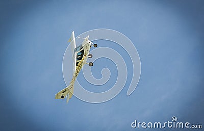 Small airplane in flight Editorial Stock Photo