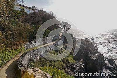 Small alley coast path way of Saint-Palais-sur-Mer from the customs officer trail Stock Photo