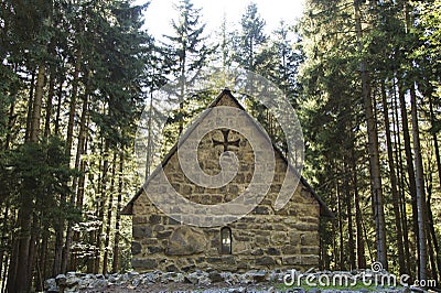 Small ancient church in a forest, Georgia Stock Photo