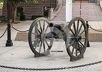 Small artillery canon at the front of the historic Tarrant County Courthouse in Fort Worth, Texas. Stock Photo