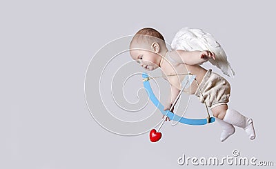 Small baby cupid with angel wings Stock Photo