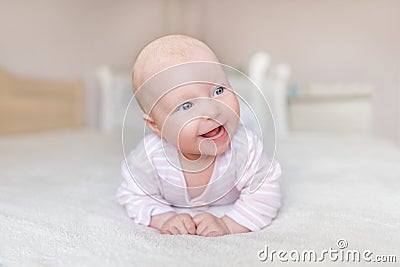 A small baby in a good mood. Stock Photo