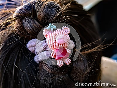 small baby hair small doll in baby hair Stock Photo