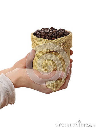 Small bag of coffee beans in female hands Stock Photo