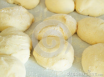 Small balls of dough with flour for cakes and biscuits, close up Stock Photo