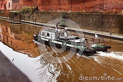 Small barge in the canal Editorial Stock Photo