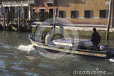 Small barge in Venice Editorial Stock Photo