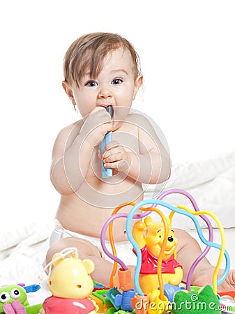 Small beautiful baby girl in a angel fansy dress Stock Photo