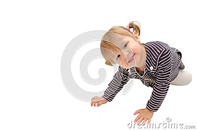 The small beautiful girl looks forward Stock Photo