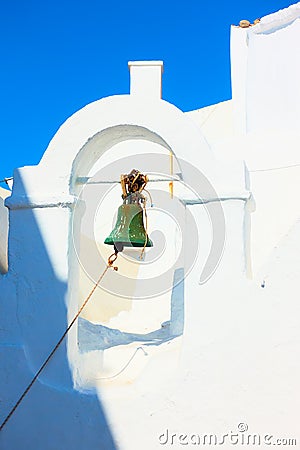 Small bell tower of ancient greek church in Mykonos Stock Photo