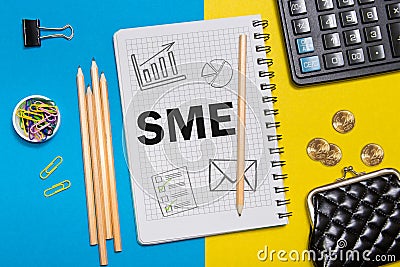 Small and Medium Enterprise, SME notes in the notebook on the Desk of a businessman in office. Business concept SME Stock Photo